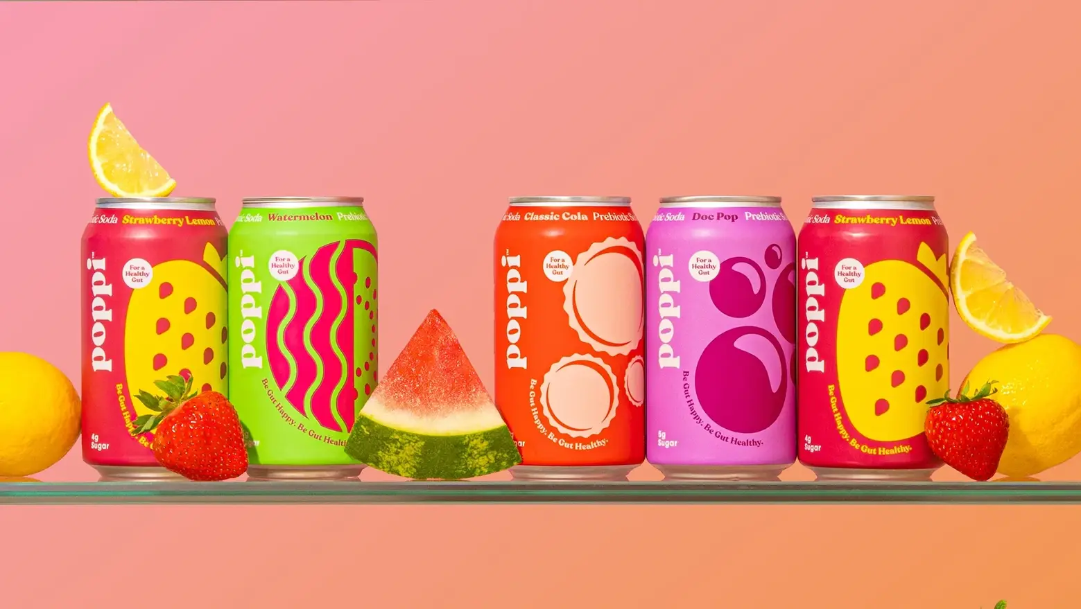 a pink background with pops of cans lined with different flavours of poppi